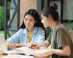 young-asian-students-campus-helps-friend-catching-up-learning 1